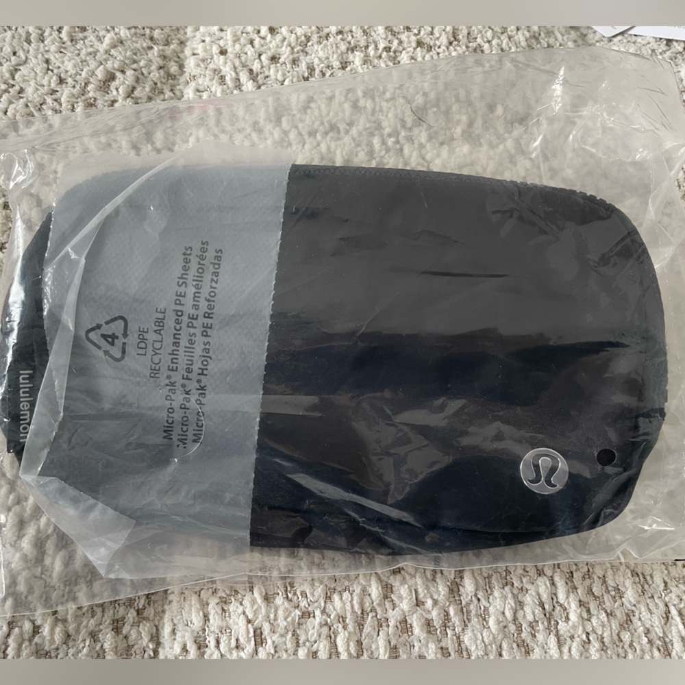 NWT Black belt bag with white lettering